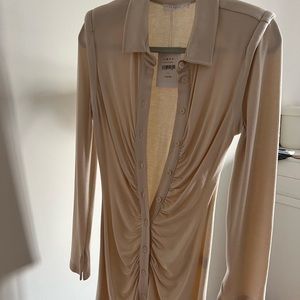 Brand new. Front button and padded.